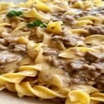 creamy ground beef stroganoff over egg noodles