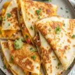 Crispy easy chicken quesadilla with gooey cheese