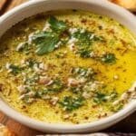 Garlic Olive Oil Dip in bowl ready for bread dipping