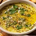 Garlic Olive Oil Dip in bowl ready for bread dipping
