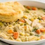 Easy Crockpot Chicken Pot Pie Recipe served hot with biscuit
