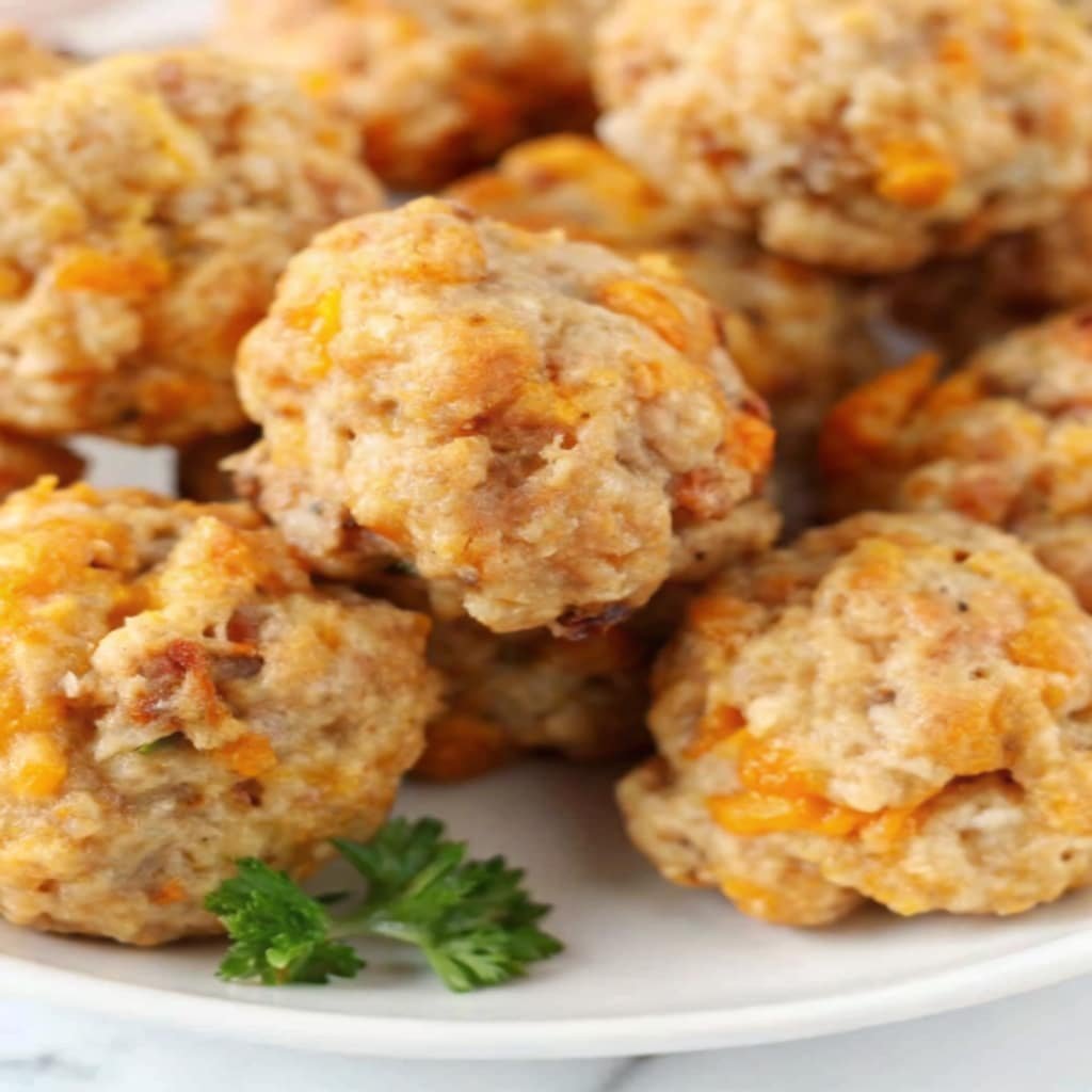 Festive Christmas Appetizers: Crowd-Pleasing Bites for Holiday Entertaining simple red lobster biscuit sausage balls pillar