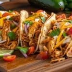 Slow cooker shredded chicken tacos with fresh toppings